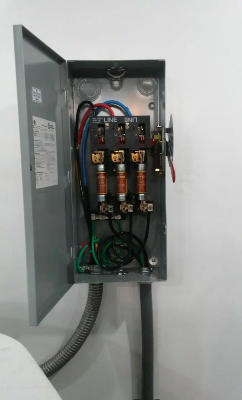 Three-phase disconnect switch installed for Smoke Detector Installation in Flint
